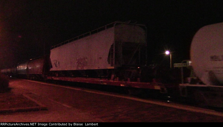 Hopper car being towed